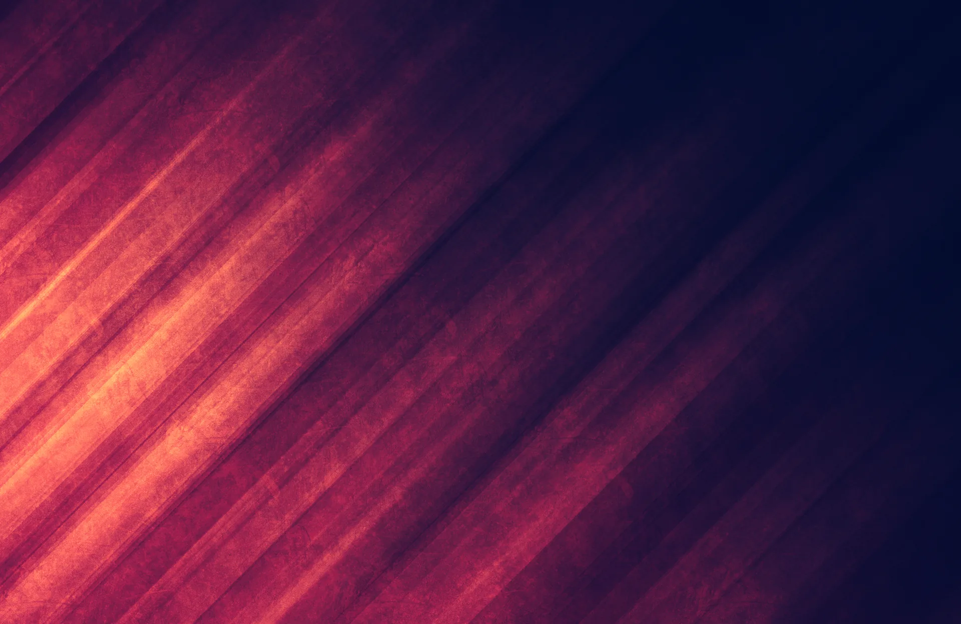 Abstract dark red and orange diagonal grunge texture representing a product launch